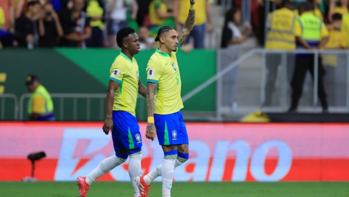 BRASILIA, BRAZIL - MARCH 20: Raphinha of Brazil celebrates after scoring the team's first goal via penalty during the South American FIFA World Cup 2026 Qualifier match between Brazil and Colombia at Mane Garrincha Stadium on March 20, 2025 in Brasilia, Brazil.